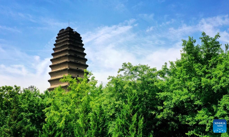 This aerial photo taken on April 18, 2023 shows a view of the Small Wild Goose Pagoda in Xi'an, northwest China's Shaanxi Province. Xi'an, a city with over 3,100 years of history, served as the capital for 13 dynasties in Chinese history. It is also home to the world-renowned Terracotta warriors created in the Qin Dynasty (221-207 BC).(Photo: Xinhua)