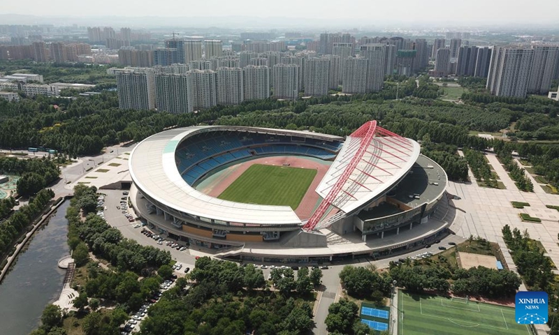 This aerial photo taken on May 8, 2023 shows a view of the stadium of the Zibo Sports Center in Zhangdian District of Zibo, east China's Shandong Province. Zibo, a city with over 3,000 years of history located in central Shandong Province, is uniquely made up of several districts that are about 20 kilometers from each other but well-connected with traffic lines.(Photo: Xinhua)