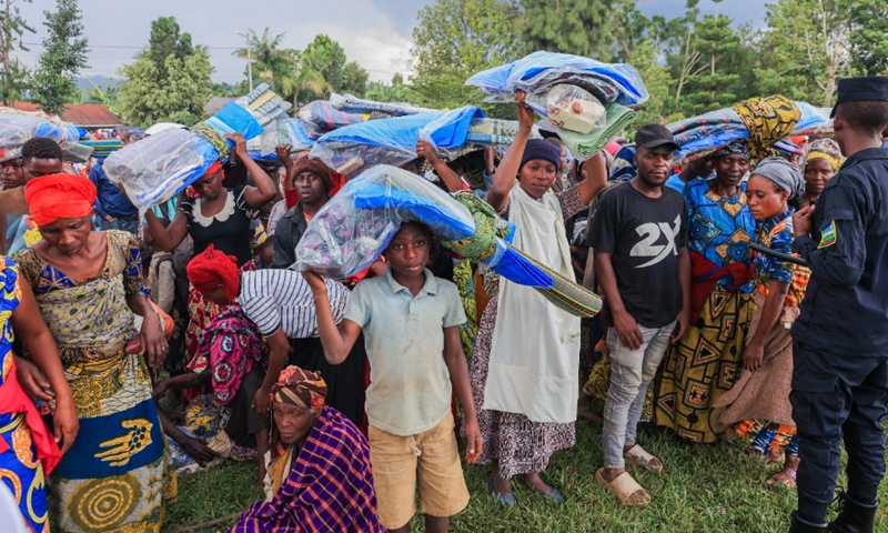 Displaced people receive disaster relief materials in Rubavu District, Western Province, Rwanda, on May 4, 2023. (Photo: Xinhua)