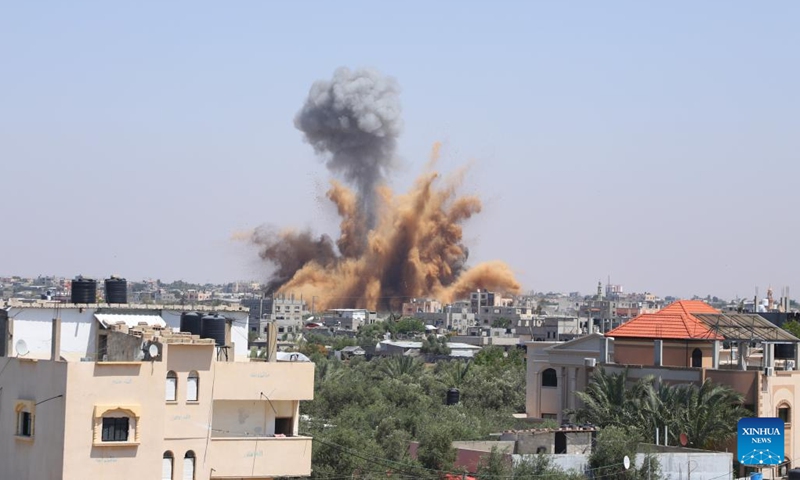 Smoke rises following an Israeli airstrike in the southern Gaza Strip city of Rafah, on May 10, 2023. At least 21 Palestinians were killed and 64 were injured in the continuing Israeli airstrikes on the Gaza Strip, said the Palestinian Health Ministry in Gaza on Wednesday.(Photo: Xinhua)