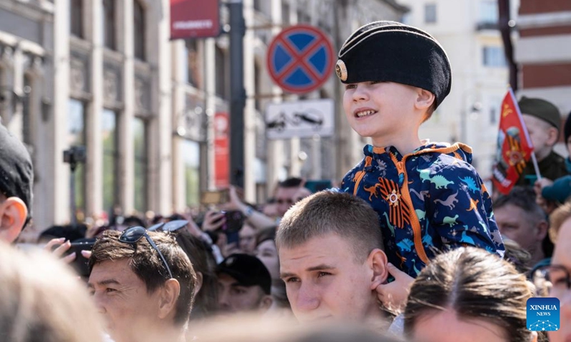 People watch the military parade marking the 78th anniversary of the Soviet victory in the Great Patriotic War, Russia's term for World War II, in Vladivostok, Russia, May 9, 2023. Photo: Xinhua