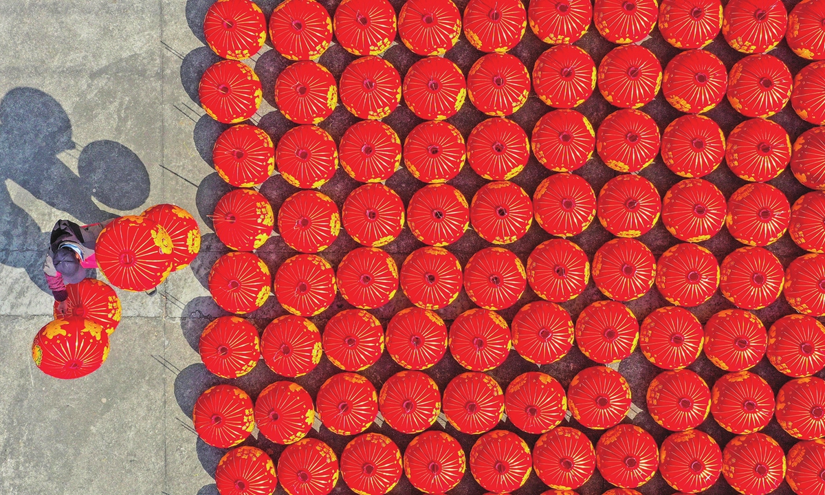 Red lanterns are displayed at a local factory in Taizhou, East China's Zhejiang Province on May 9, 2023. Making lanterns has been a way to make more money for local farmers. Along with rising incomes for rural residents, rural consumption is expected to accelerate and be upgraded. Photo: cnsphoto
