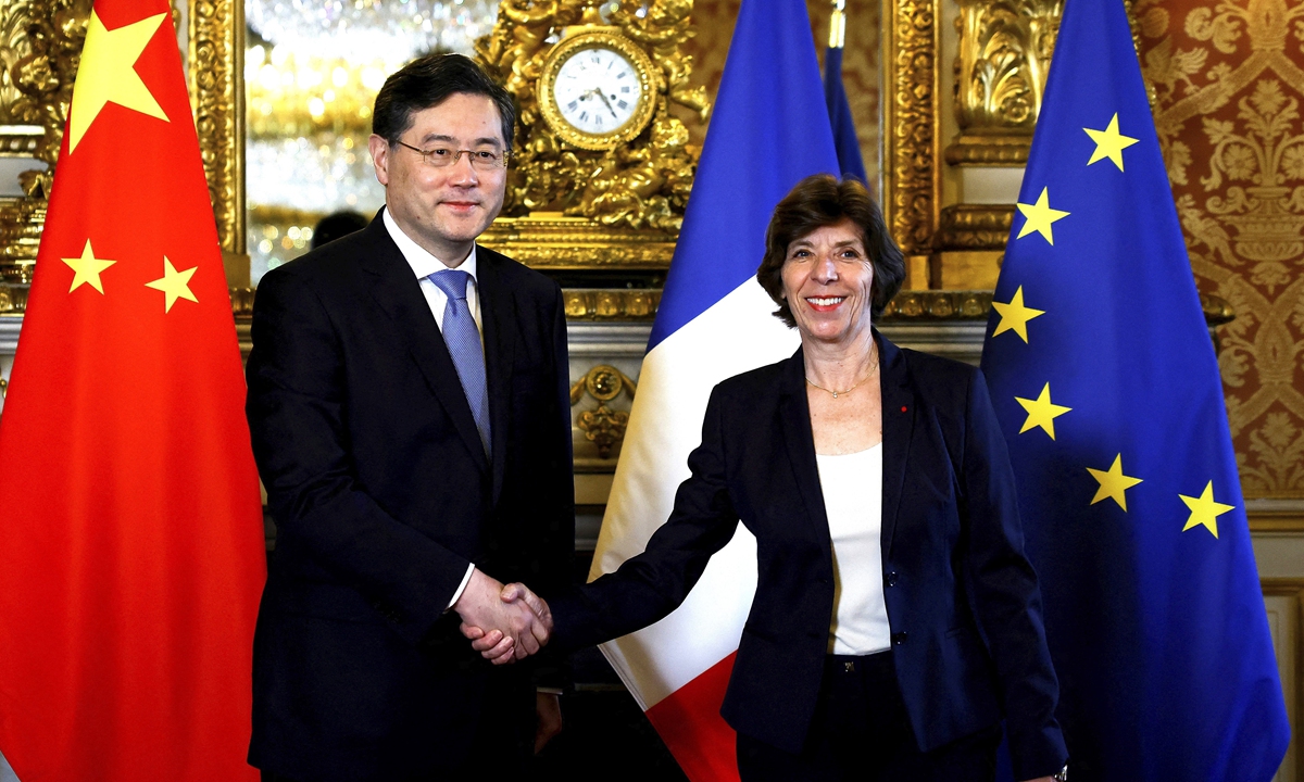Chinese State Councilor and Foreign Minister Qin Gang (left) shakes hands with French Minister for Europe and Foreign Affairs Catherine Colonna during a meeting in Paris on May 10, 2023. Qin said China is ready to work with France to accelerate the advancement of exchanges and cooperation in various fields. Photo: VCG