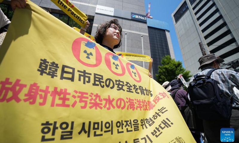 South Koreans rally in front of the headquarters of Tokyo Electric Power Company (TEPCO) to protest against the Japanese government's plan to discharge nuclear-contaminated water into the sea in Tokyo, Japan, May 16, 2023. Hundreds of Japanese people on Tuesday gathered at multiple locations in Tokyo to protest against the government's plan to discharge nuclear-contaminated water from the crippled Fukushima Daiichi Nuclear Power Plant into the sea, demanding immediate suspension of such plan(Photo: Xinhua)