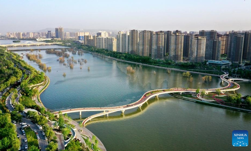 This aerial photo taken on April 16, 2023 shows the scenery along the Bahe River at the Chanba ecological zone in Xi'an, northwest China's Shaanxi Province. Areas surrounding the Bahe River in historic city of Xi'an is picturesque and full of ecological vitality.(Photo: Xinhua)