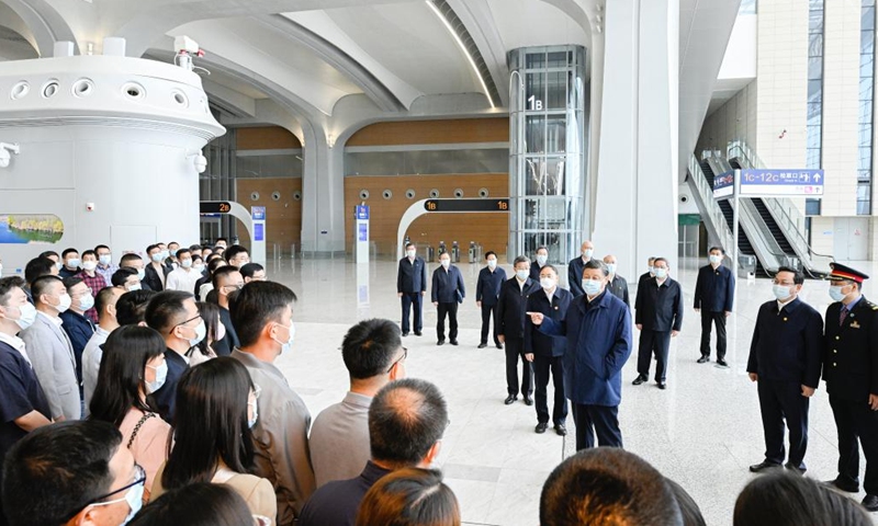 Chinese President Xi Jinping, also general secretary of the Communist Party of China Central Committee and chairman of the Central Military Commission, talks with passengers at the waiting hall of the Xiong'an Railway Station in the Xiong'an New Area, north China's Hebei Province, May 10, 2023. Xi on Wednesday inspected Xiong'an in north China's Hebei Province and presided over a meeting on promoting its development.(Photo: Xinhua)