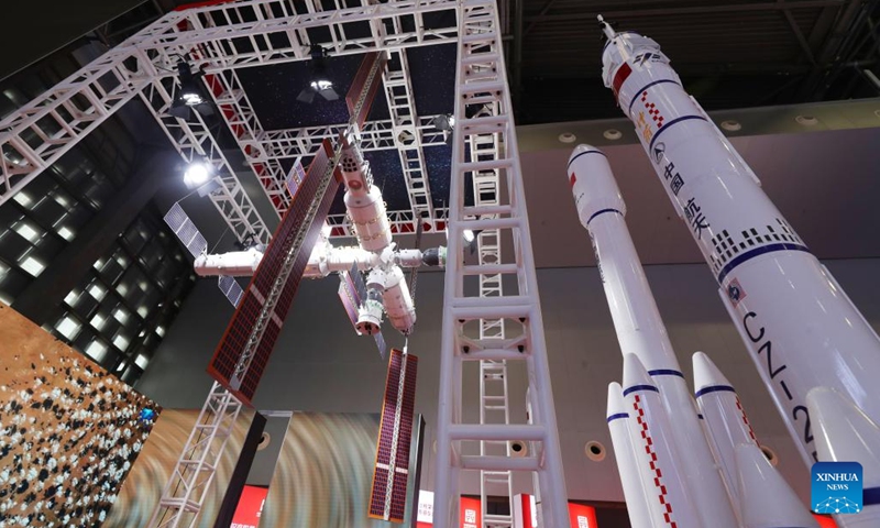 This photo taken on May 10, 2023 shows a model of China's space station and a series of models of China's Long March rocket family at the Exposition on China Brand 2023 in east China's Shanghai. The Exposition on China Brand 2023 kicked off Wednesday at the Shanghai World Expo Exhibition and Convention Center. Around 1,000 Chinese enterprises participated in the exposition, showcasing the new look of current Chinese brands to the world.(Photo: Xinhua)