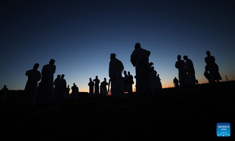 Members of the Samaritan community take part in the pilgrimage for the holy day of Passover on the top of Mount Gerizim, near the West Bank city of Nablus, May 10, 2023.(Photo: Xinhua)
