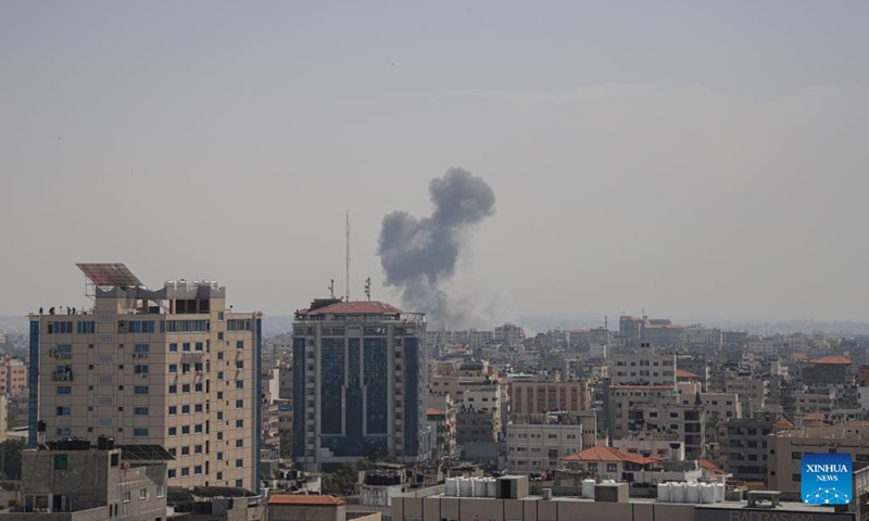 Smoke rises following an Israeli airstrike in the southern Gaza Strip city of Rafah, on May 11, 2023. Israeli fighter jets Thursday continued intensive airstrikes on the Gaza Strip for a third day in a row in response to rockets fired towards Israel, leaving 28 Palestinians killed and 93 injured.(Photo: Xinhua)