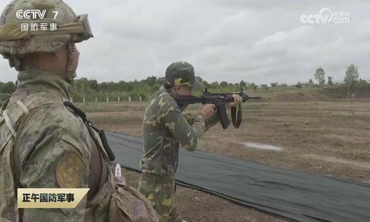 Chinese and Lao troops exchange weapons in the live-fire shooting practices during the Friendship Shield-2023 joint exercise in May, 2023. Photo: Screenshot from China Central Television