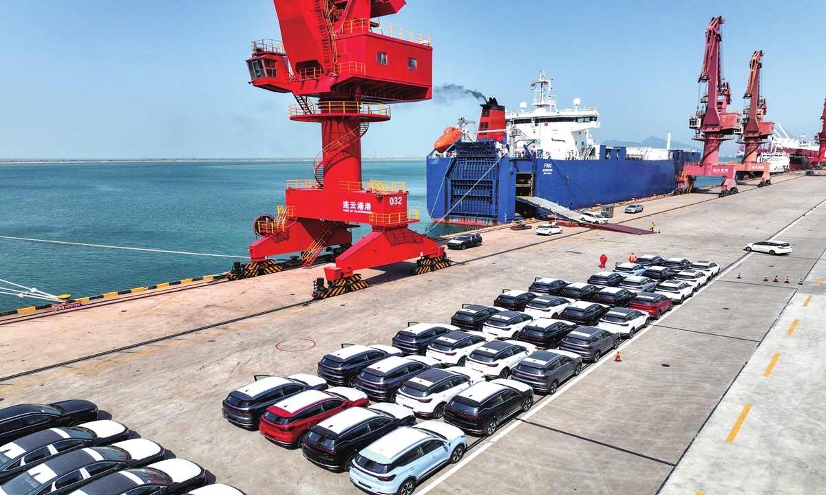 A ro-ro vessel parks at a berth loading trucks for export at a terminal in Lianyungang port in Lianyungang, East China's Jiangsu Province on May 15, 2023. China's auto exports rose 89.2 percent year-on-year in the first four months of 2023. Photo: VCG