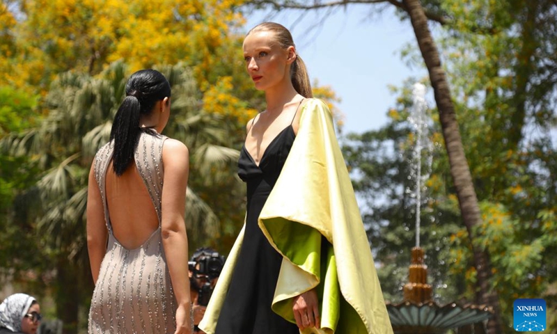 Models present creations at the first edition of the Egypt Fashion Week in Cairo, Egypt, May 13, 2023. More than 70 Egyptian designers showcased their collections on and off the runway in the first edition of the Egypt Fashion Week, a four-day event that began on Friday.(Photo: Xinhua)