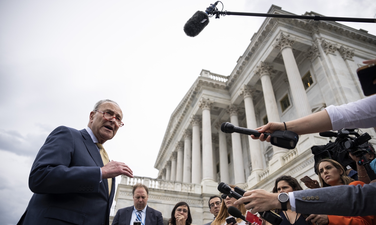 US Senate Majority Leader Chuck Schumer speaks to reporters outside the Capitol upon returning from the White House May 16, 2023 in Washington, DC. The Democratic and Republican leaders met with President Joe Biden as negotiations continue about raising the debt limit and avoiding a default by the federal government. Photo: VCG