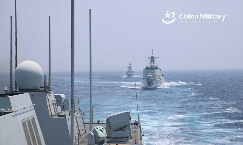 Naval vessels assigned to a destroyer flotilla with the navy under the PLA Southern Theater Command sail in formation during a coordination training exercise in early May, 2023. (eng.chinamil.com.cn/Photo by Yang Yunxiang)