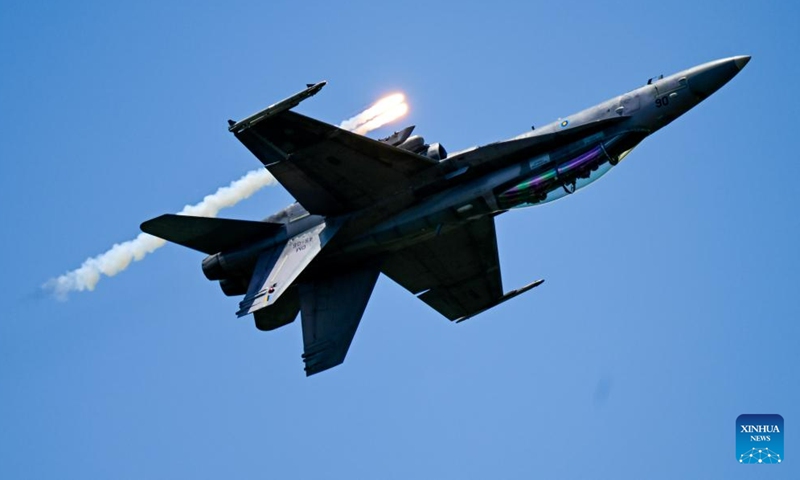 An F/A-18D fighter of Royal Malaysian Air Force performs during the air show at the 16th Langkawi International Maritime and Aerospace Exhibition (LIMA 2023) in Langkawi, Malaysia, May 25, 2023. (Xinhua/Zhu Wei)