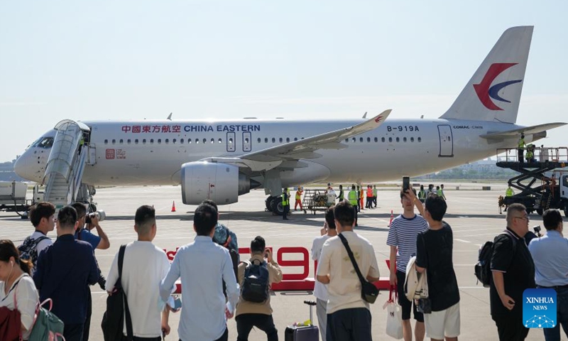 This photo taken on May 28, 2023 shows a C919, China's self-developed large passenger aircraft, before its first commercial flight in east China's Shanghai. C919 kicked off its first commercial flight from Shanghai to Beijing on Sunday, marking its official entry into the civil aviation market. (Xinhua)