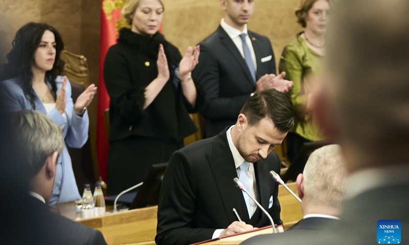 Montenegro's president-elect Jakov Milatovic takes the oath during his inauguration ceremony in Podgorica, Montenegro, May 20, 2023. Newly elected president of Montenegro Jakov Milatovic took the oath of office on Saturday at the country's parliament in Podgorica. (Photo by Predrag Milosavljevic/Xinhua)