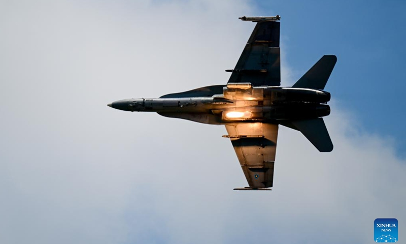 An F/A-18D fighter of Royal Malaysian Air Force performs during the air show at the 16th Langkawi International Maritime and Aerospace Exhibition (LIMA 2023) in Langkawi, Malaysia, May 25, 2023. (Xinhua/Zhu Wei)