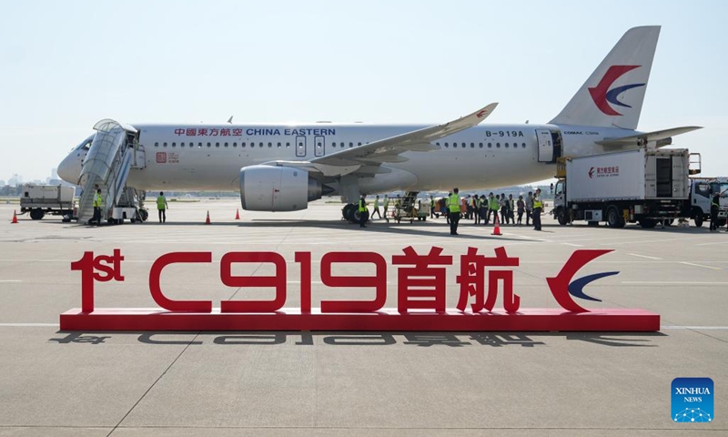 This photo taken on May 28, 2023 shows a C919, China's self-developed large passenger aircraft, getting ready for its first commercial flight in east China's Shanghai. C919 kicked off its first commercial flight from Shanghai to Beijing on Sunday, marking its official entry into the civil aviation market. (Xinhua)