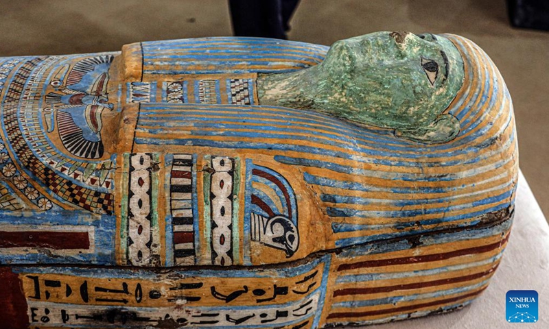 This photo taken on May 27, 2023 shows a colored mummy coffin exhibited during an archaeological discovery press conference in Saqqara necropolis, south of the capital Cairo, Egypt. Egypt announced on Saturday the discovery of two ancient embalming workshops for humans and animals along with two tombs and a collection of artifacts in Saqqara necropolis, south of the capital Cairo. (Xinhua/Ahmed Gomaa)