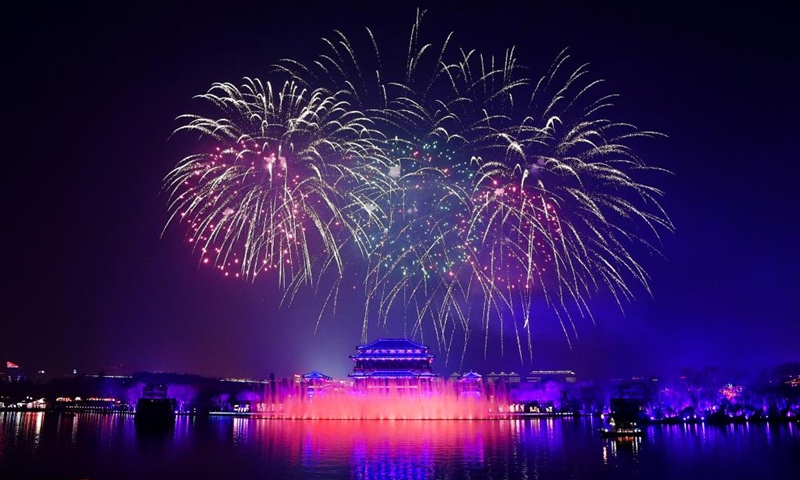 Tourists watch fireworks at the Tang Paradise in Xi'an, northwest China's Shaanxi Province, Feb. 5, 2023. The Tang Paradise, located in the south of Xi'an, is a large cultural theme park showing the life style of the prosperous Tang Dynasty (618-907).(Photo: Xinhua)