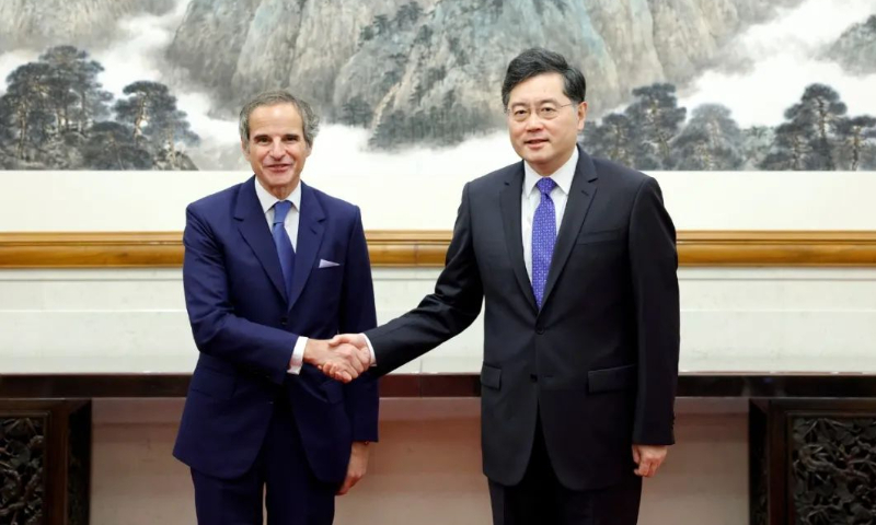 Chinese State Councilor and Foreign Minister Qin Gang (right) meets with IAEA Director-General Rafael Mariano Grossi on Tuesday in Beijing. Photo: China's Ministry of Foreign Affairs