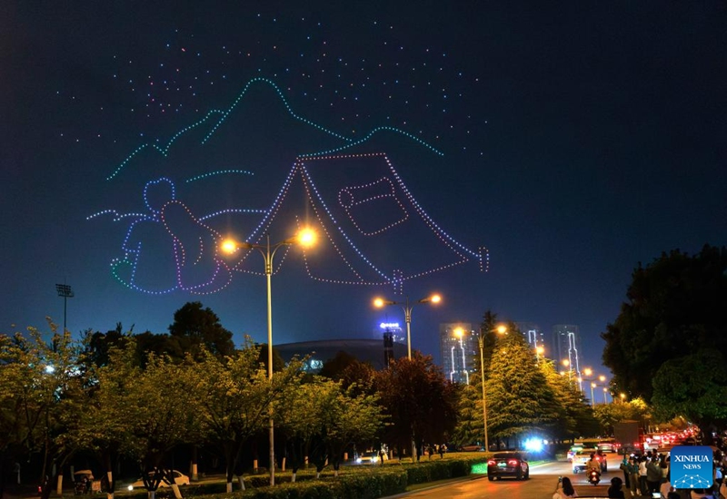 This photo taken on May 18, 2023 shows drones forming a light show in Guiyang, southwest China's Guizhou Province. Altogether 1,000 drones performed a light show over Guiyang Thursday night. (Xinhua/Liu Xu)