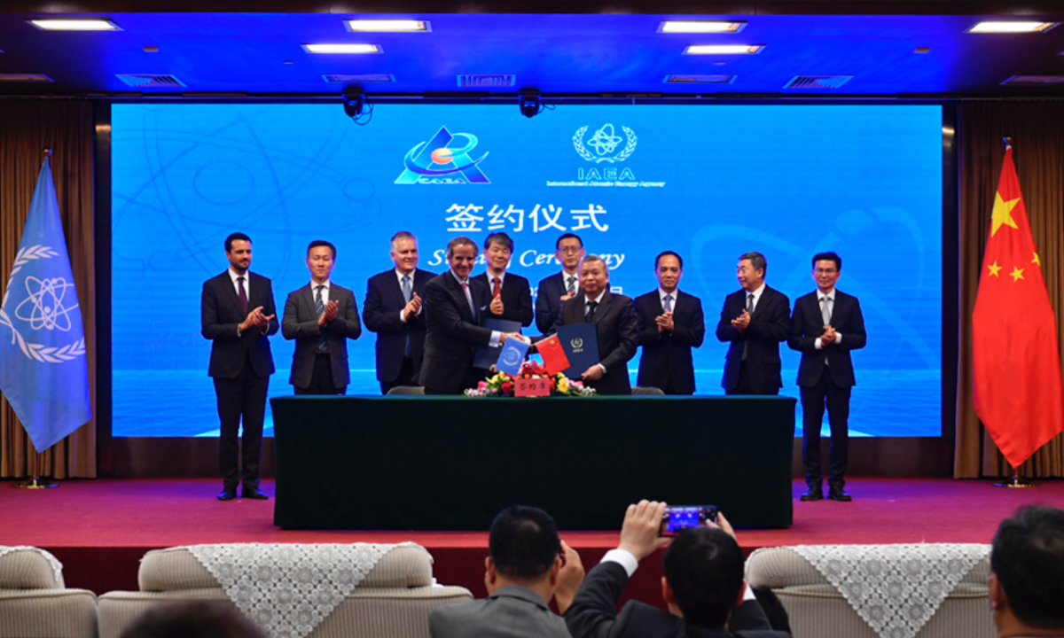 IAEA Director General Rafael Mariano Grossi (left in the front) and other IAEA officials sign agreements with the China Atomic Energy Authority (CAEA) officials on May 22, 2023. Photo: China Atomic Energy Authority