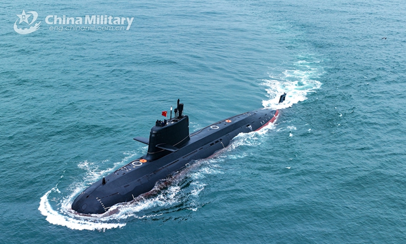 A submarine attached to a naval submarine flotilla under the PLA Northern Theater Command steams in the sea during a training exercise on May 6, 2023. (eng.chinamil.com.cn/Photo by Shi Jialong)