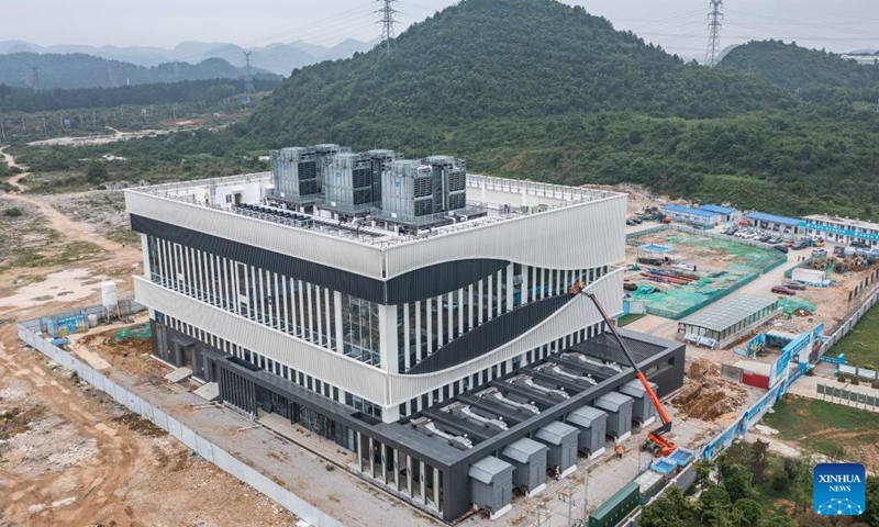 This aerial photo taken on May 23, 2023 shows the construction site of the data center of the State Power Investment Corporation Limited in Guian New Area, southwest China's Guizhou Province. In February 2022, China started work on the project to build an integrated national big data system involving the establishment of eight national computing hubs and 10 national data center clusters.(Photo: Xinhua)