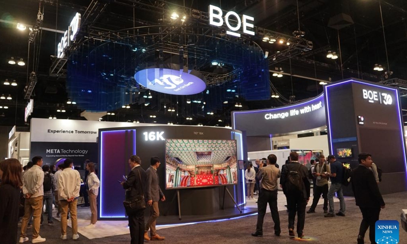People visit the exhibition area of China's BOE Technology Group during the Display Week 2023 in Los Angeles, the United States, on May 23, 2023. Chinese brands gained a strong foothold at the Display Week 2023, a world's leading show of the display industry held this week in Los Angeles, attracting lots of attention and winning recognition for their innovative technologies and products.(Photo: Xinhua)