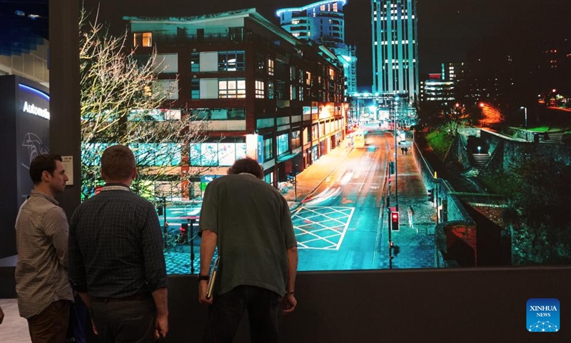 People visit the exhibition area of China's BOE Technology Group during the Display Week 2023 in Los Angeles, the United States, on May 23, 2023. Chinese brands gained a strong foothold at the Display Week 2023, a world's leading show of the display industry held this week in Los Angeles, attracting lots of attention and winning recognition for their innovative technologies and products.(Photo: Xinhua)