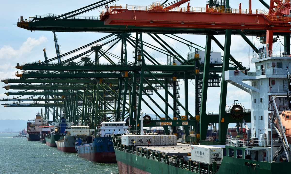 Cargo ships load containers at Jiangyin Port in Fuzhou, East China's Fujian Province, on June 28, 2022. Photo: VCG