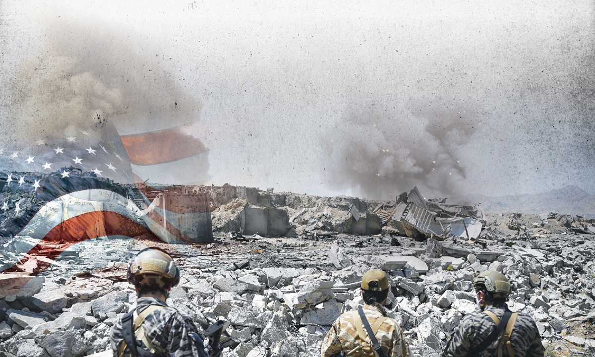 Members of the Taliban Badri 313 military unit walk amid debris of the destroyed Central Intelligence Agency base in Deh Sabz district northeast of Kabul on September 6, 2021 after the US pulled all its troops out of the country. Photo: VCG
