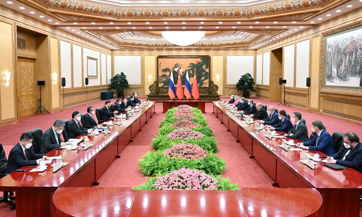 Chinese President Xi Jinping meets with Prime Minister of the Russian Federation Mikhail Mishustin at the Great Hall of the People in Beijing, capital of China, May 24, 2023. (Xinhua/Zhang Ling)