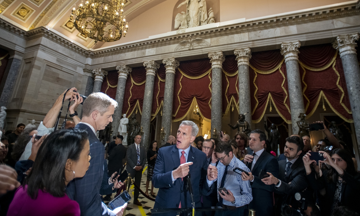 US house speaker Kevin McCarthy offers remarks on the current debt ceiling crisis negotiations in Statuary Hall at the US Capitol in Washington, DC, May 24, 2023. Ratings agency Fitch put the US' credit on watch for a possible downgrade on May 24, raising the stakes as talks over the country's debt ceiling go down to the wire, and adding to the jitters in global markets. Photo: VCG