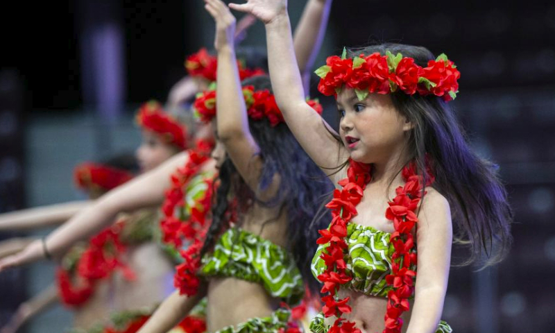 Children dance during the 2023 Carassauga Festival of Cultures in Mississauga, the Greater Toronto Area, Canada on May 27, 2023. (Photo by Zou Zheng/Xinhua)
