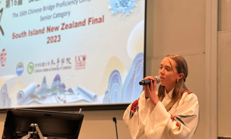 A contestant competes in the annual Chinese Bridge Chinese Proficiency Competition in Christchurch, New Zealand's South Island, May 28, 2023. University, secondary and primary school students from across New Zealand's South Island competed for Chinese proficiency in the annual Chinese Bridge Chinese Proficiency Competition held on Sunday. (Photo by Walter/Xinhua)