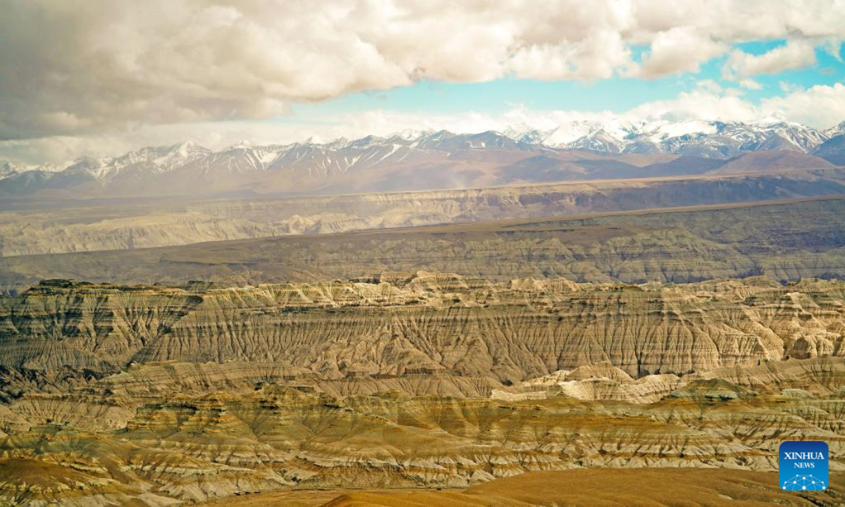 This photo taken on May 25, 2023 shows the landscape of earth forest in Zanda County, southwest China's Tibet Autonomous Region. Zanda is famous for the unique landscape of earth forest, which was formed by geological movement and soil erosion. These 