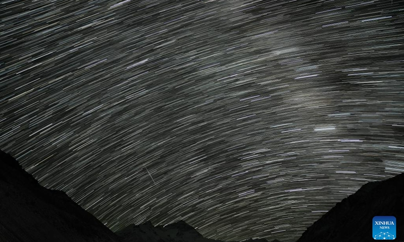 This composite photo taken on May 23, 2023 shows star trails above the Mount Qomolangma base camp in southwest China's Tibet Autonomous Region.(Photo: Xinhua)
