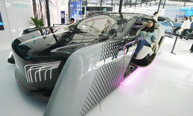 This photo taken on May 27, 2023 shows the HQ Intelligent System (HIS) at the exhibition area of Zhongguancun Forum in Beijing, capital of China. New energy vehicles and relevant products take the spotlight at this year's Zhongguancun Forum (ZGC Forum). (Xinhua/Zhang Chenlin)