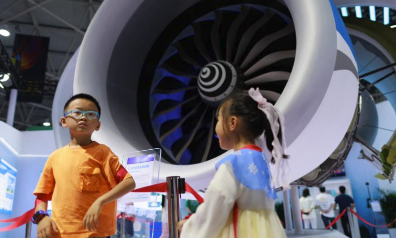 This photo taken on May 27, 2023 shows the HQ Modular Electric (HME) at the exhibition area of Zhongguancun Forum in Beijing, capital of China. New energy vehicles and relevant products take the spotlight at this year's Zhongguancun Forum (ZGC Forum). (Xinhua/Ren Chao)