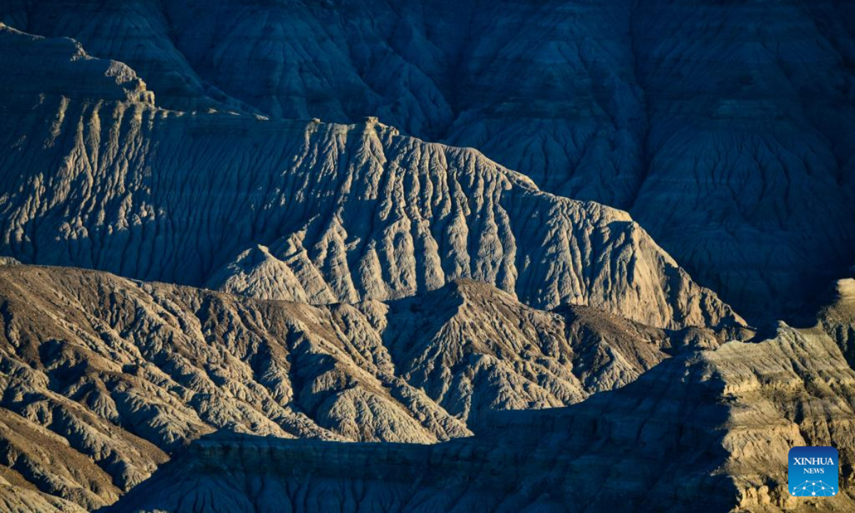This photo taken on May 25, 2023 shows the landscape of earth forest in Zanda County, southwest China's Tibet Autonomous Region. Zanda is famous for the unique landscape of earth forest, which was formed by geological movement and soil erosion. These