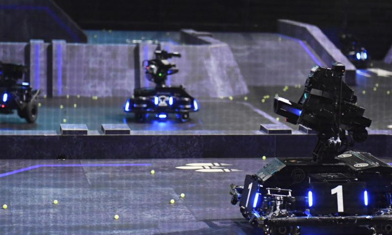 Robots of team TOE from Dalian Jiaotong University are pictured during the RoboMaster 2023 University Championship Regional Competition (South China) in Changsha, central China's Hunan Province, May 28, 2023. The four-day regional competition concluded in Changsha on Sunday, with team RobotPilots from Shenzhen University winning the first place and team TOE from Dalian Jiaotong University being the second. (Xinhua/Chen Zhenhai)