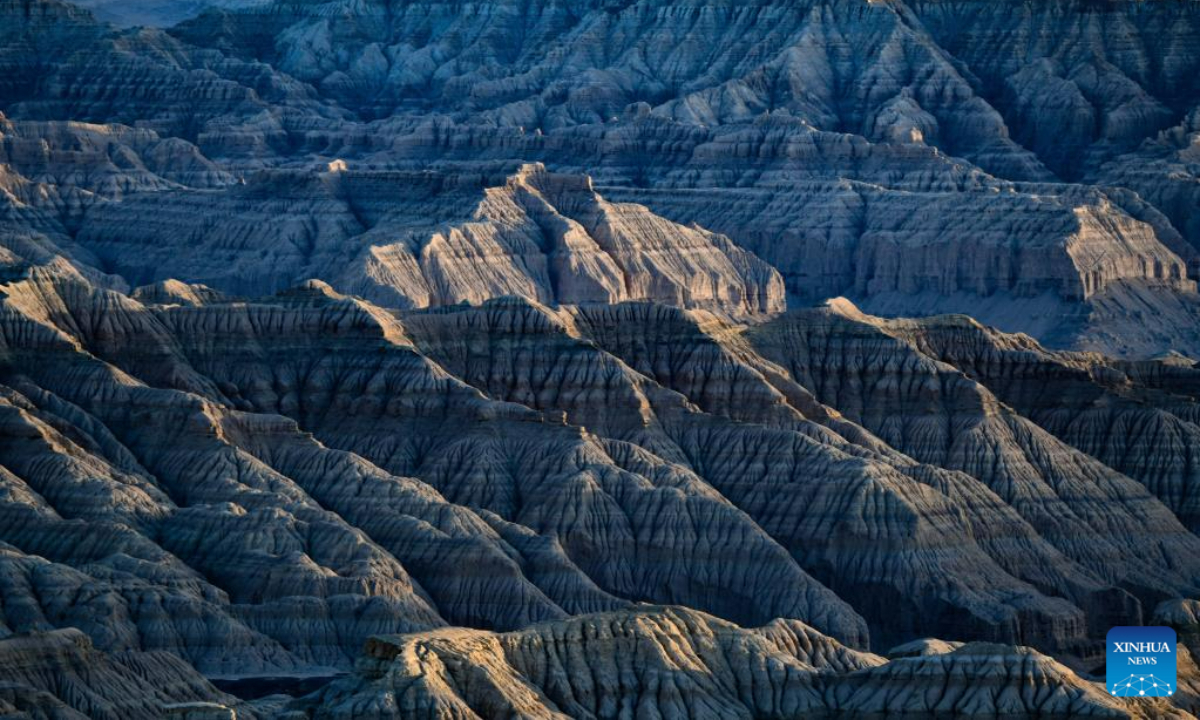 This photo taken on May 25, 2023 shows the landscape of earth forest in Zanda County, southwest China's Tibet Autonomous Region. Zanda is famous for the unique landscape of earth forest, which was formed by geological movement and soil erosion. These