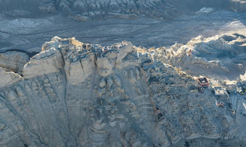 This aerial photo taken on May 26, 2023 shows the scenery of the ruins of the Guge Kingdom at dusk in Zanda County of Ngari Prefecture, southwest China's Tibet Autonomous Region. The ancient Guge Kingdom was probably founded in the 10th century but it was abandoned by the end of the 17th century. Only the mud-and-rock structures remained, sheltering their relics and wall paintings from the elements.