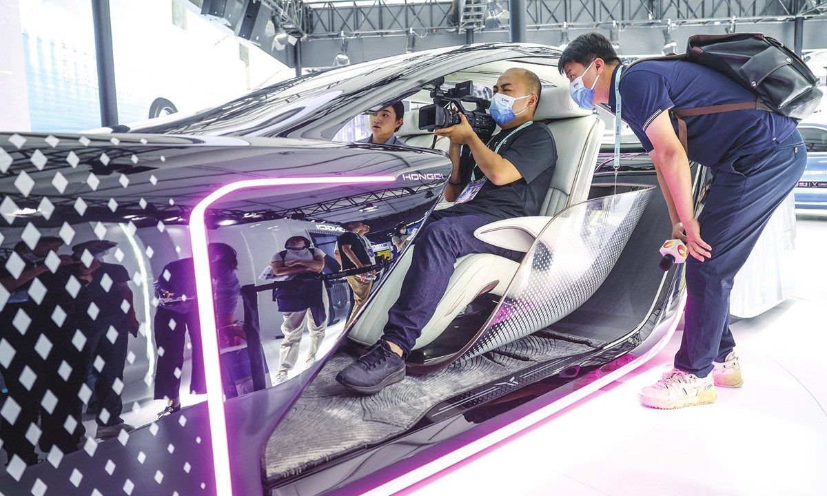 A new concept car draws visitors at the Exhibition of Zhongguancun Forum in Beijing on May 26, 2023. Photo: Li Hao/GT