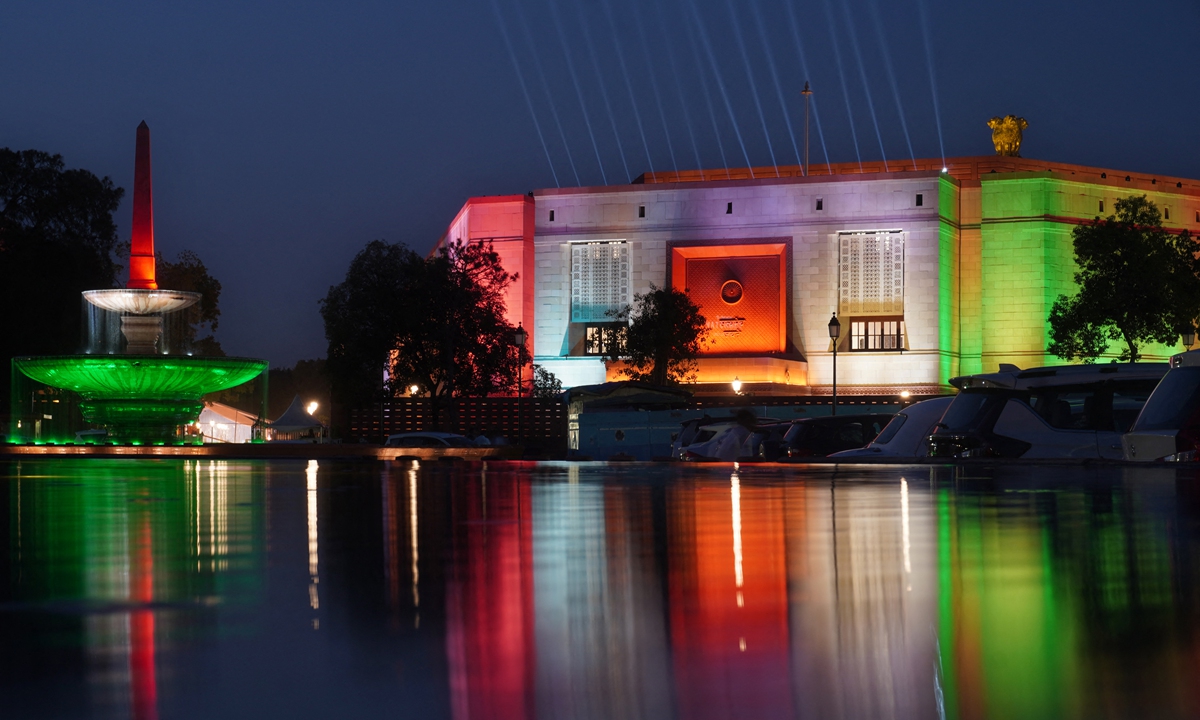 The picture shows India's new parliament building in the colors of the national tri-color on the eve of its inauguration in New Delhi on May 27, 2023. Photo: AFP