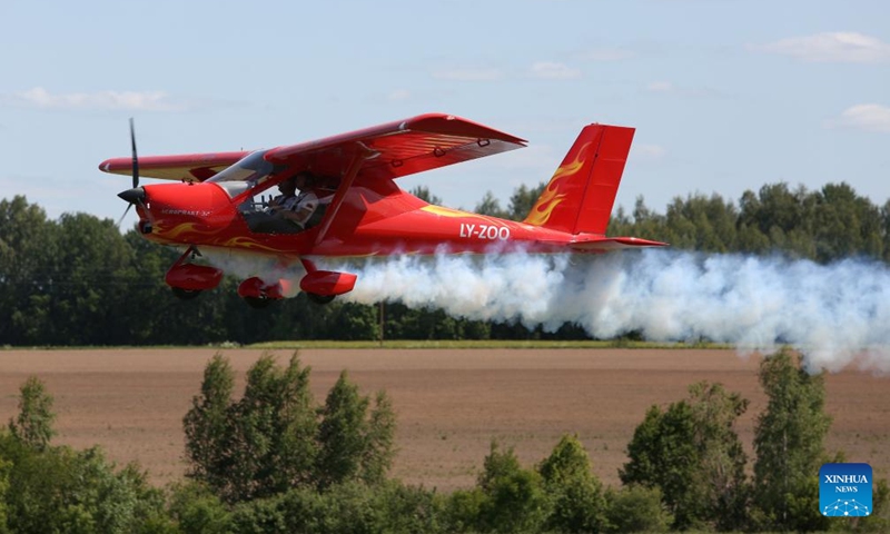 An aircraft performs during the Fly in Limbazi air show in Limbazi, Latvia, on June 10, 2023. (Photo by Edijs Palens/Xinhua)
