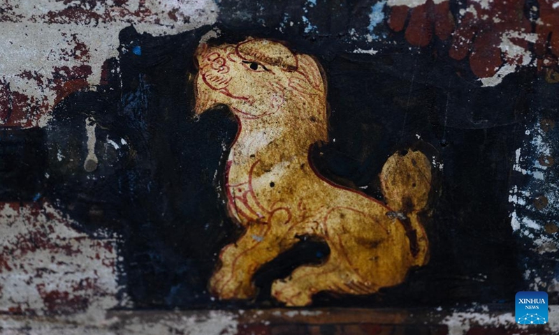 This photo taken on May 26, 2023 shows a lion in a mural in a grotto in Zanda County of Ngari Prefecture, southwest China's Tibet Autonomous Region. Known as the Donggar and Piyang grottoes, the 1,000-year-old caverns in the Tibet Autonomous Region's Ngari Prefecture hold one of the world's greatest collections of Tibetan Buddhist murals.(Photo: Xinhua)